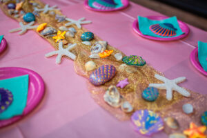 Pink mermaid themed table set up