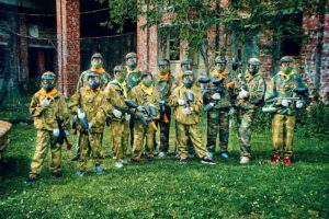 Kids dressed in camo gear for paint ball party