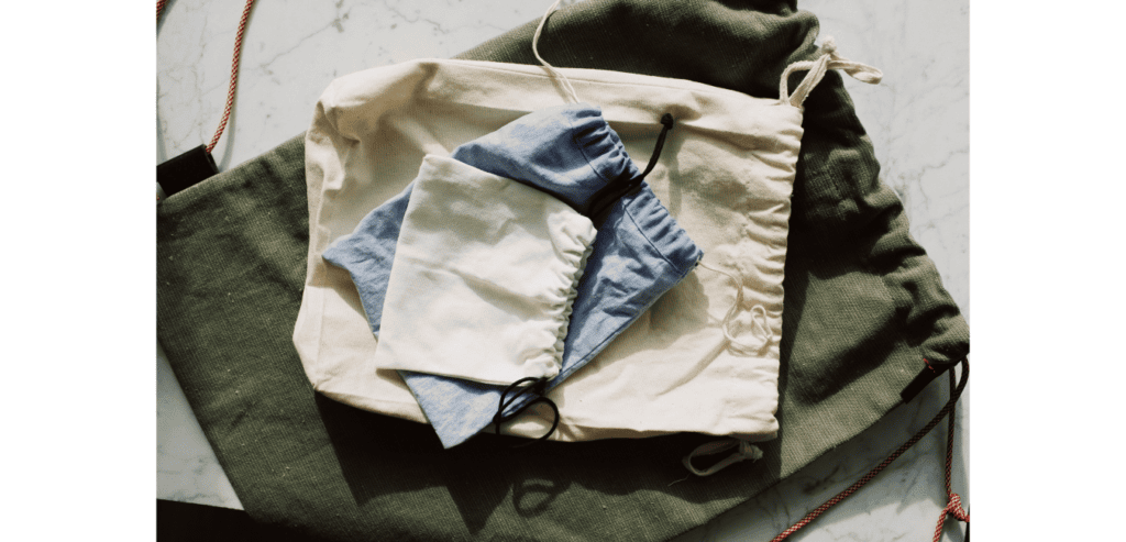 Pile of fabric drawstring bags