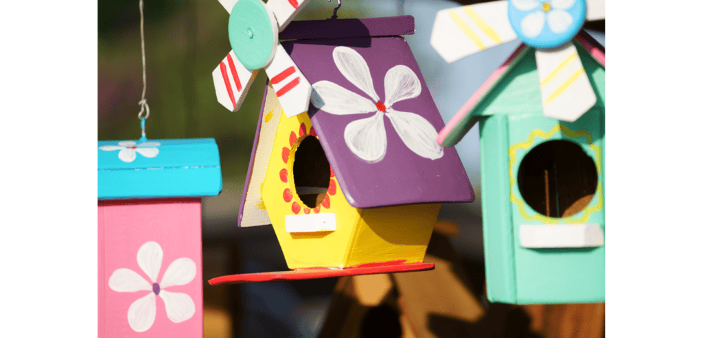 Brightly painted bird house