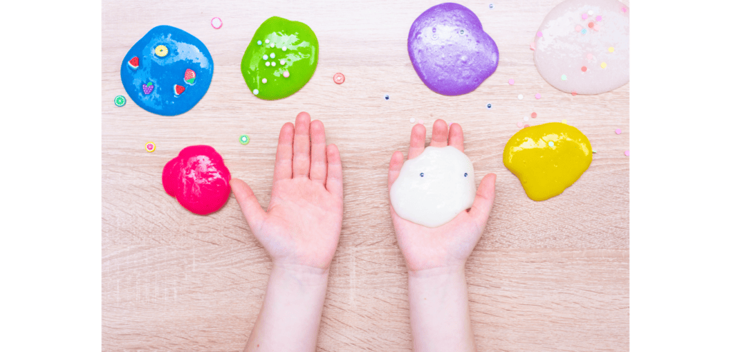 Blobs of slime and kids hands