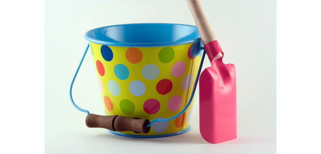 A spotted bucket and a pink spade