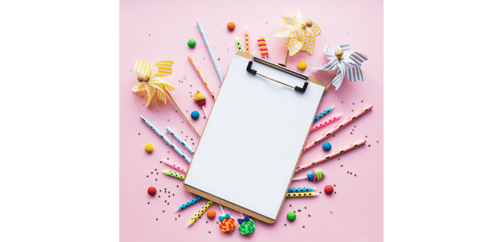 A clip board with party accessories
