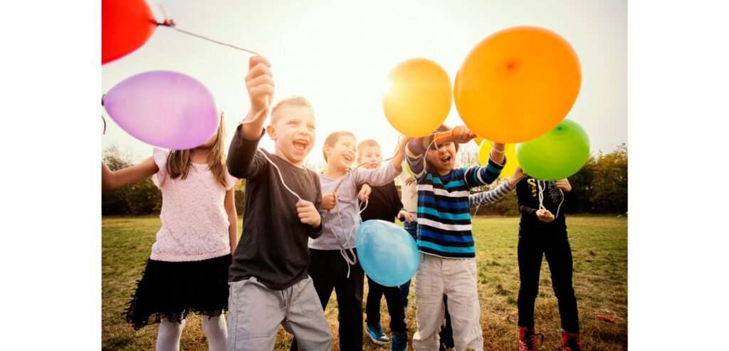 Kids with balloons