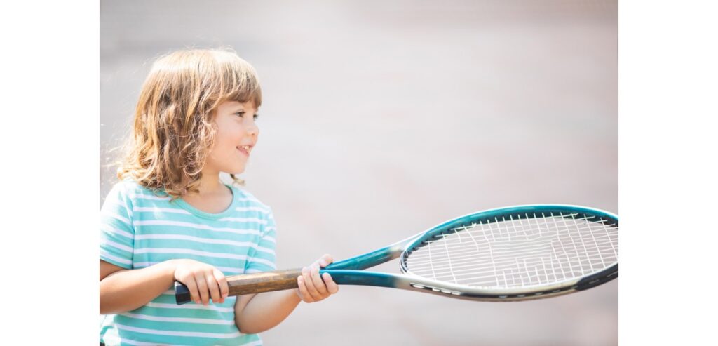 Girl with tennis racket