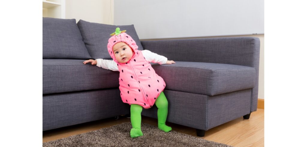 Baby dressed as a strawberry