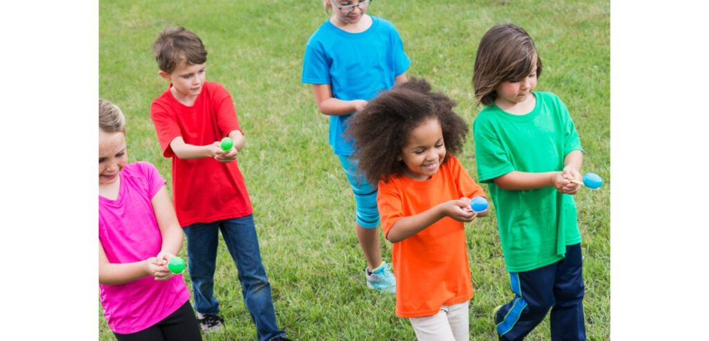 Children doing egg and spoon race