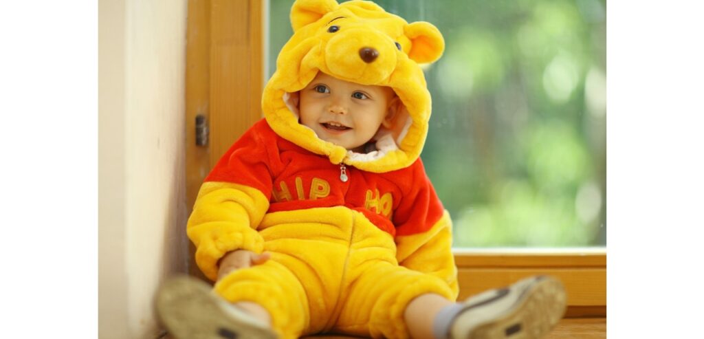Baby dressed as Winnie the Pooh