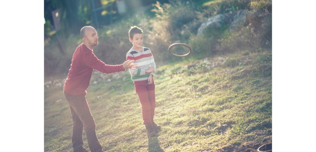 Two people playing quoits
