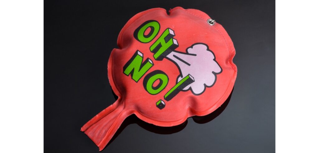 A red whoopee cushion