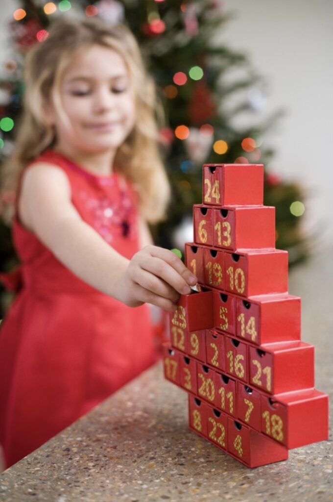 Girl with her advent calendar