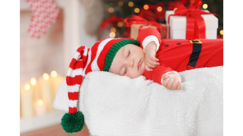 Little baby in a christmas elf hat