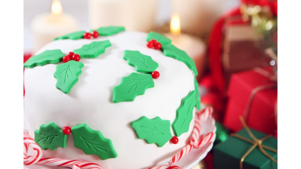 Christmas cake with holly on it