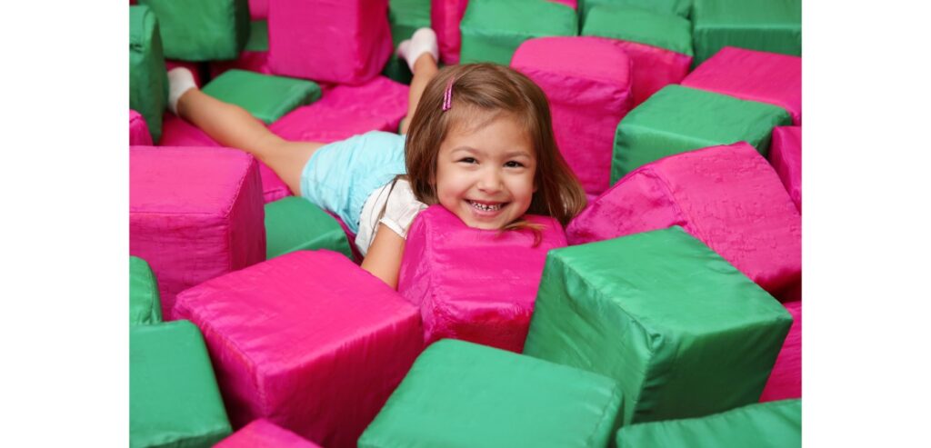 Girl in soft play