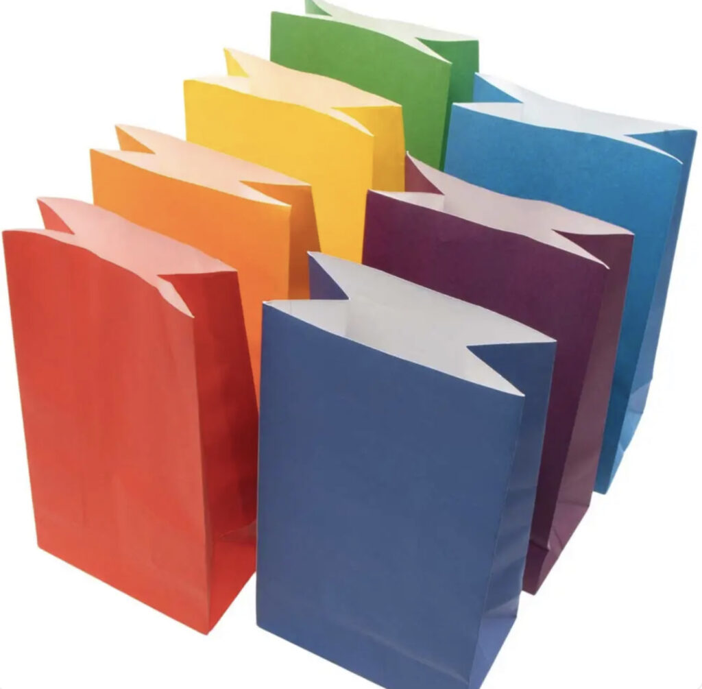 Rainbow coloured paper party bags