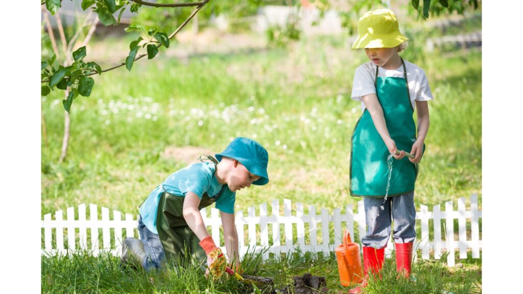 Two children doing some gardening