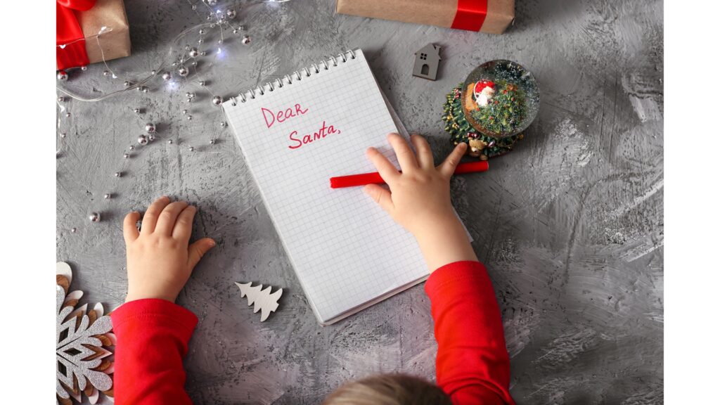 Child writing letter to santa
