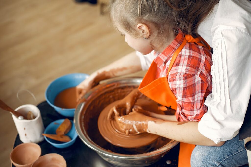 Child at pottery wheel