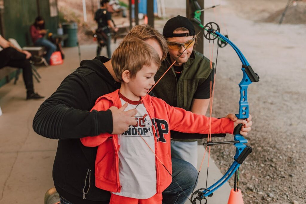 Boy with a bow and arrow