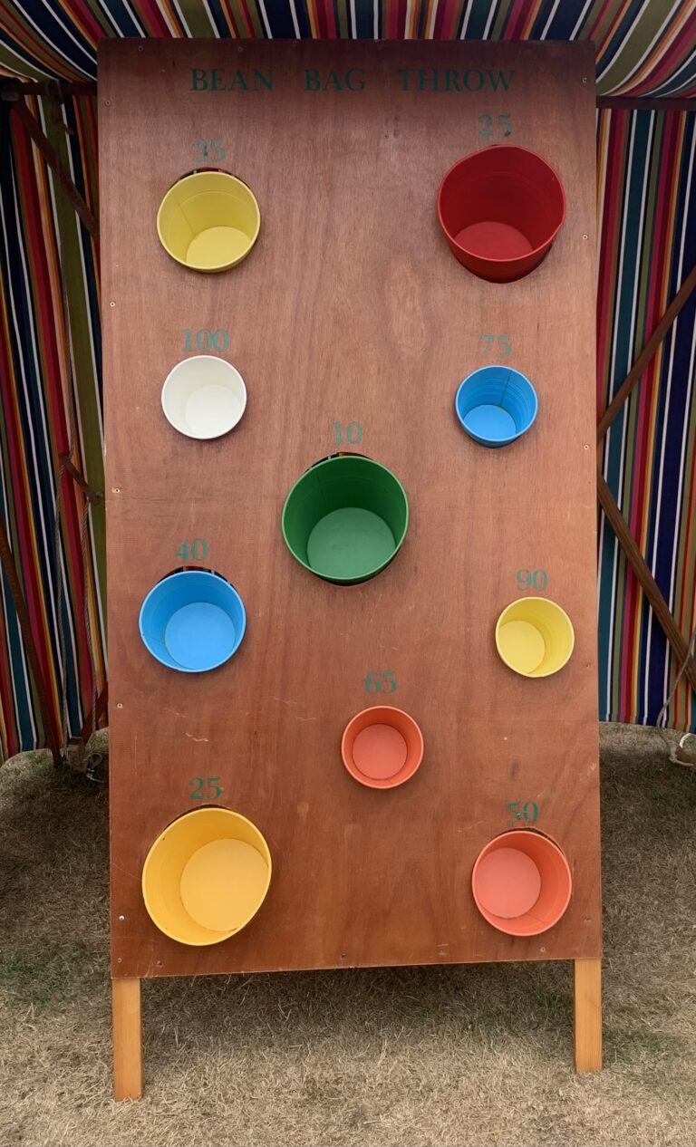Lots of coloured buckets on a board