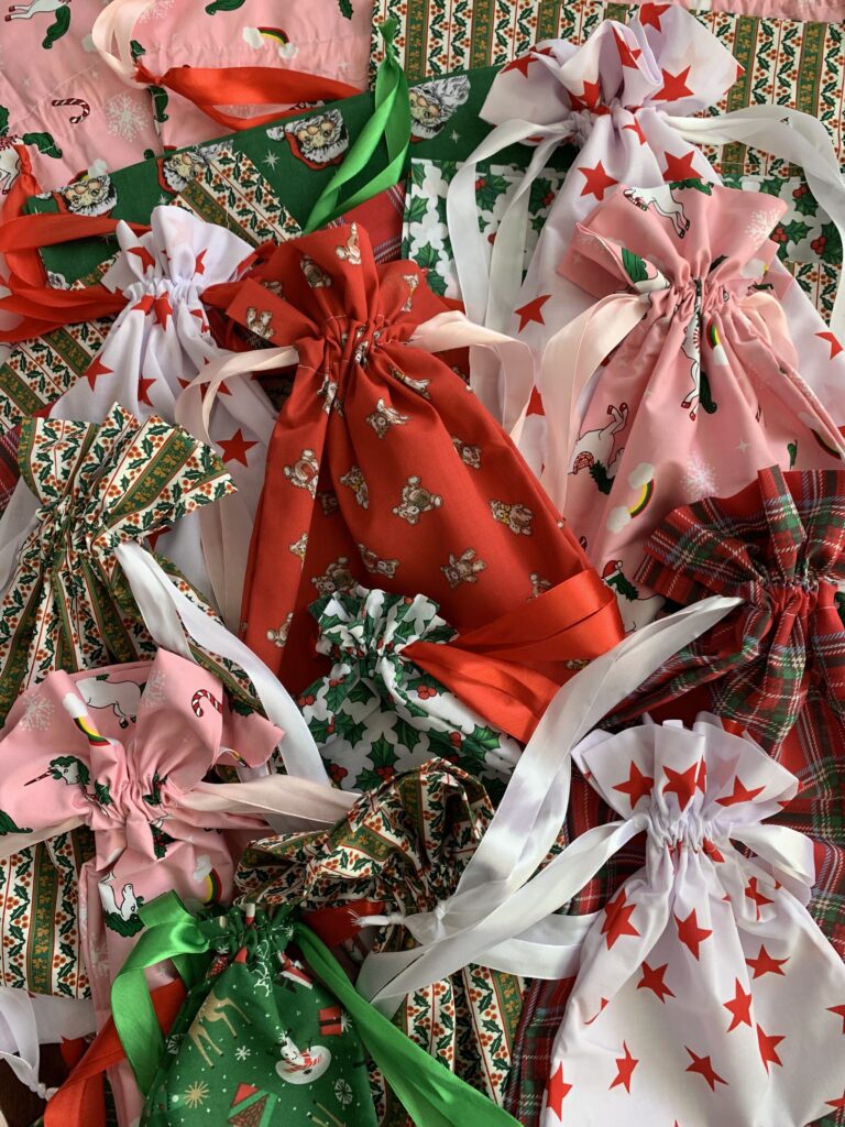 Selection of Christmas fabric drawstring bags