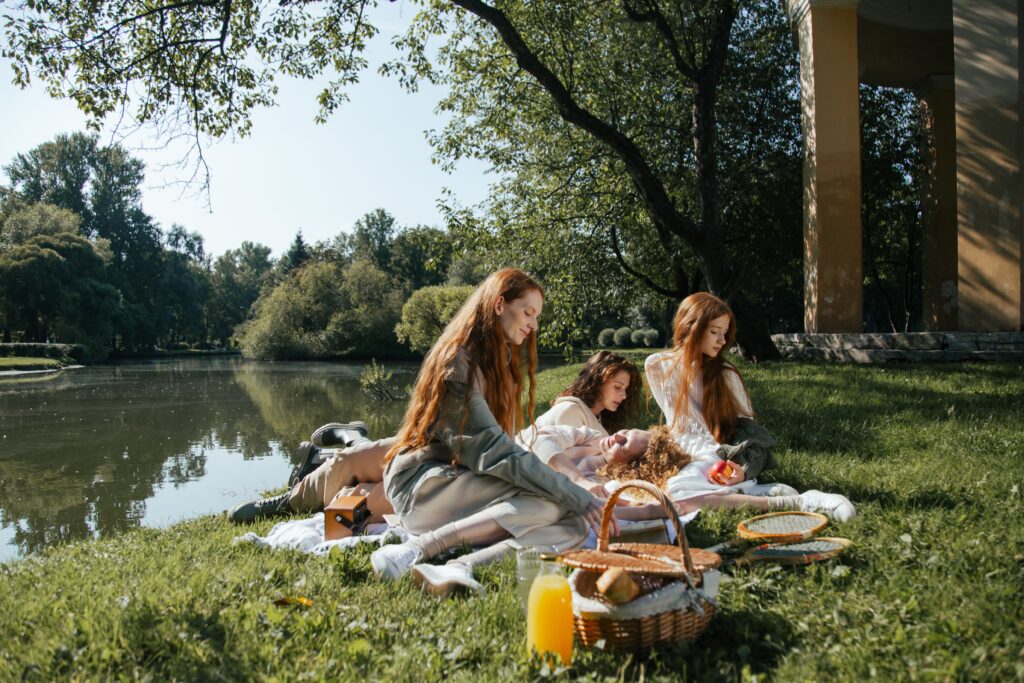 Girls having a picnic in the park - Teenage birthday party ideas
