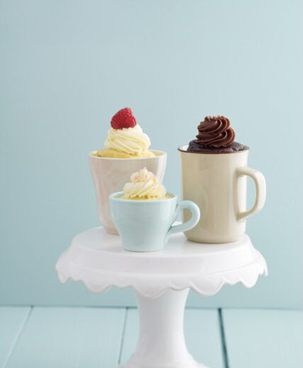 Three mug cakes on a cake stand
