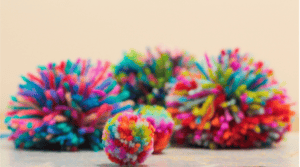 Selection of coloured pom-poms