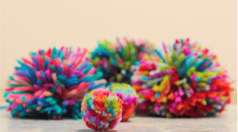 Selection of coloured pom-poms