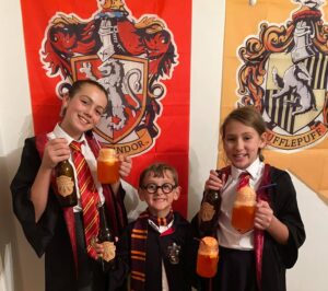 Kids drinking Harry Potter ginger beer