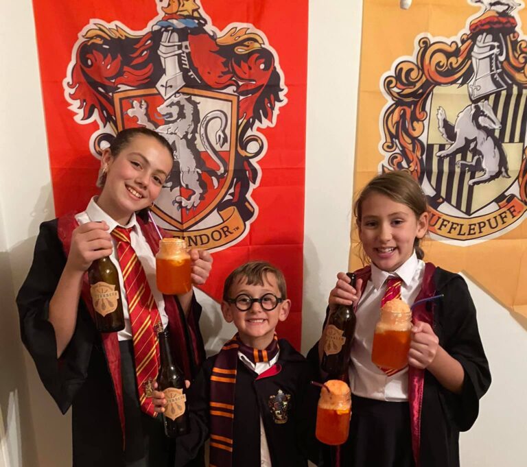 Kids drinking Harry Potter ginger beer