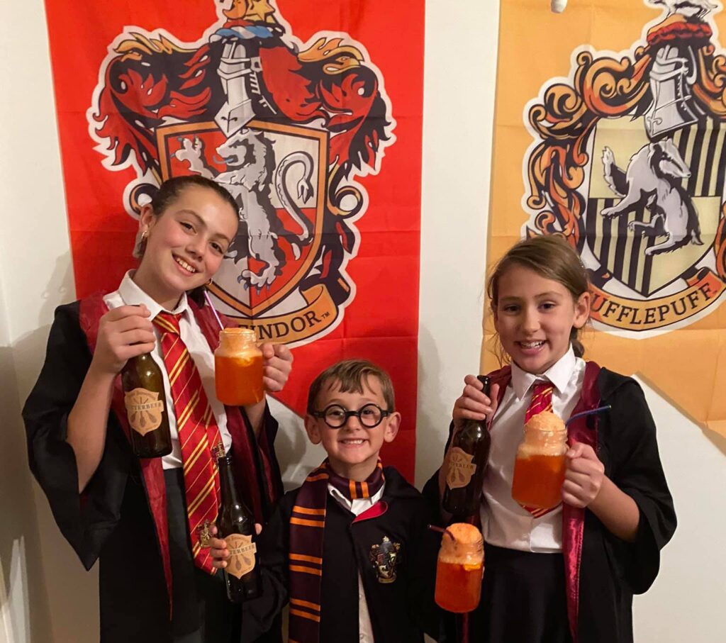 Kids drinking Harry Potter ginger beer