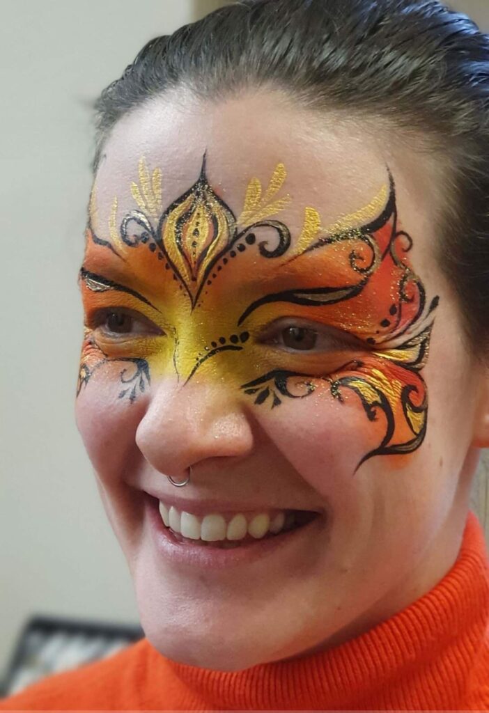 Tahlia with her face painted - party suppliers offering inclusive parties