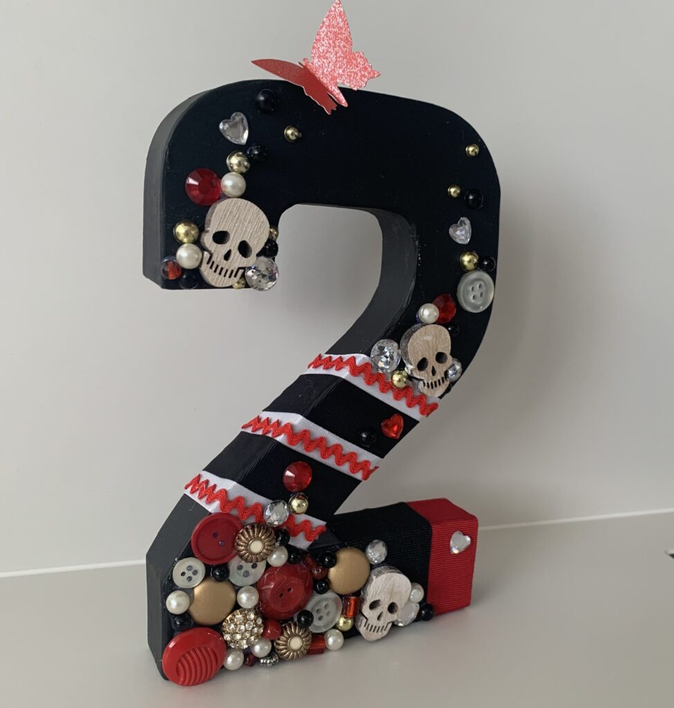 Papier mache decorated number two