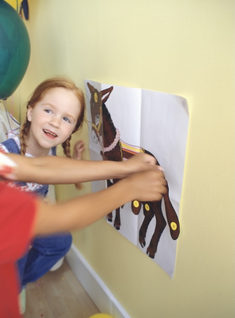 Children pinning the tail on the donkey