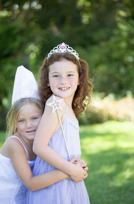 Two little girls dressed as princesses