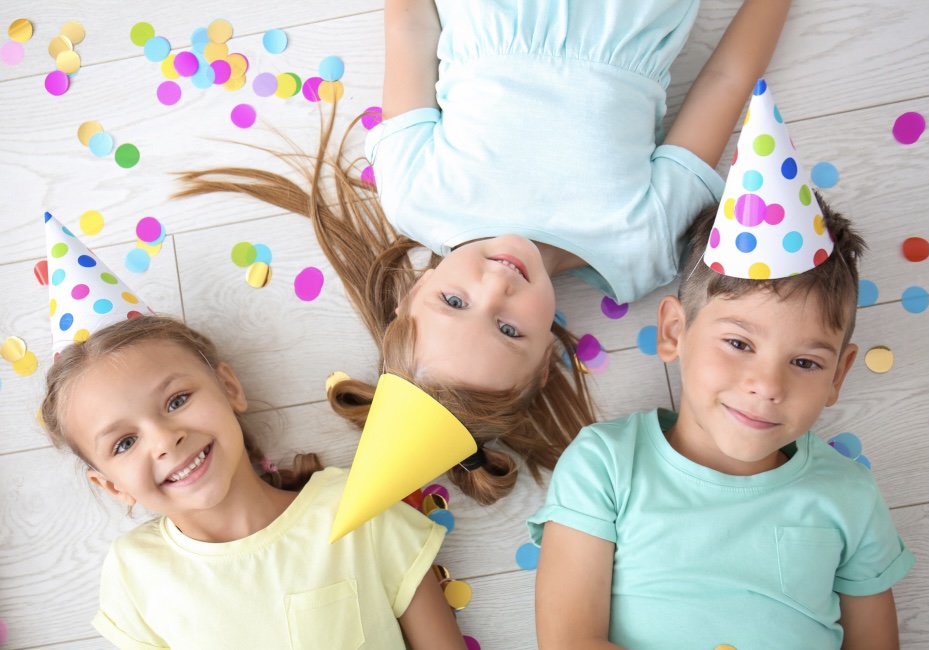 Children with party hats on