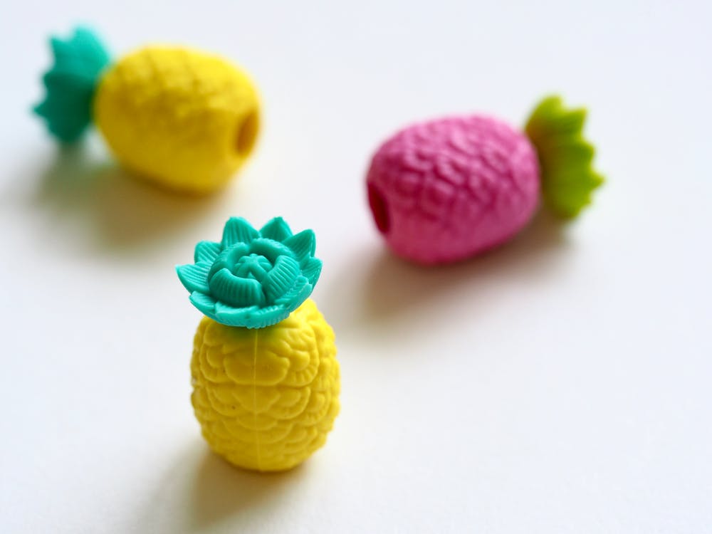 Pineapple shaped rubbers in yellow and pink