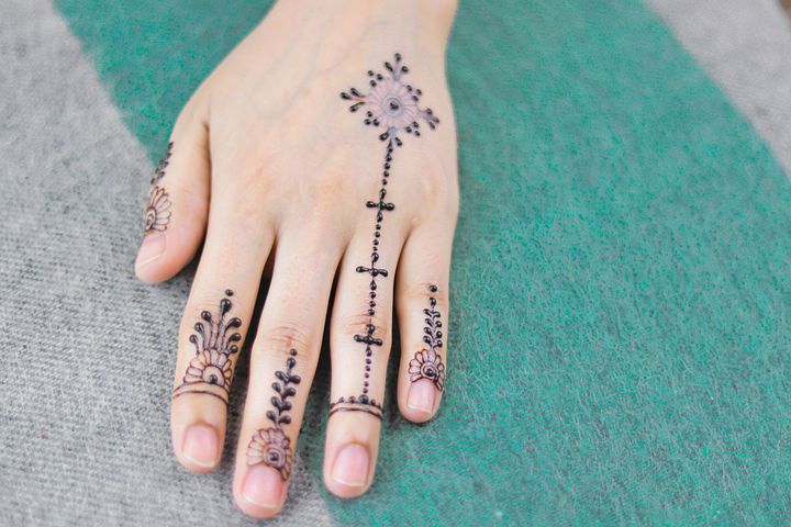 Henna painted hand