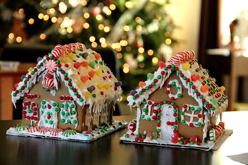 A gingerbread house covered in sweets