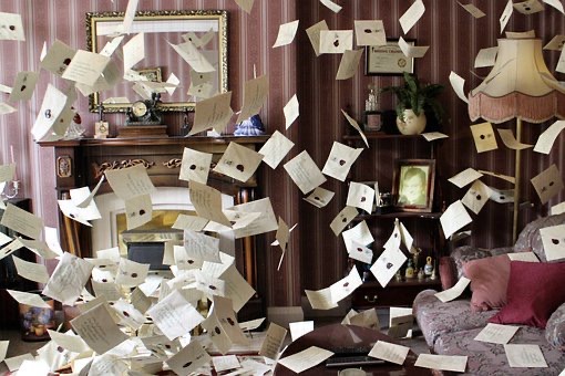 Room full of pages tumbling down like confetti