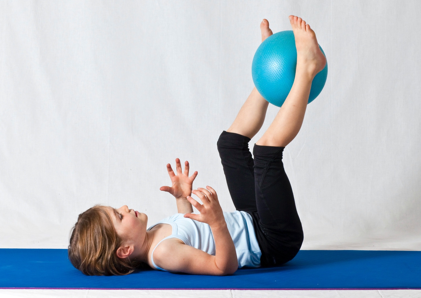 A girl with a gym ball - non gift birthday presents