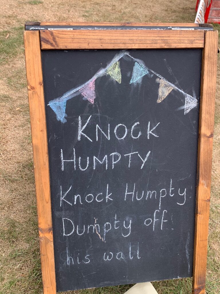 Blackboard with ‘knock humpty’ rules - Carnival style party games