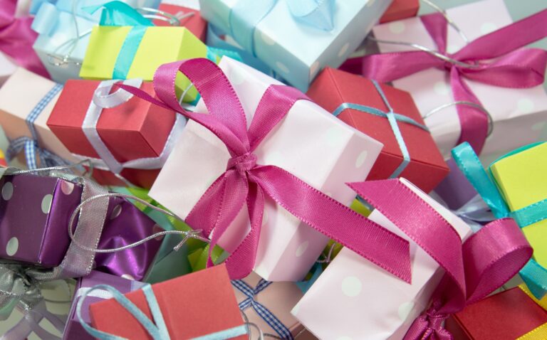 Pile of wrapped presents - How much to spend on a birthday present