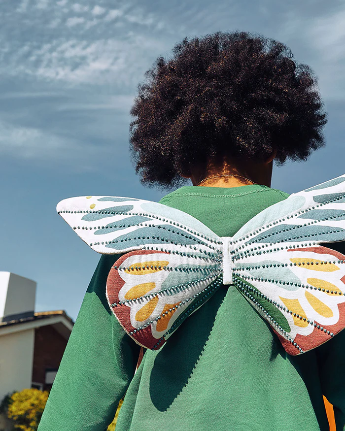 Child in butterfly wings
